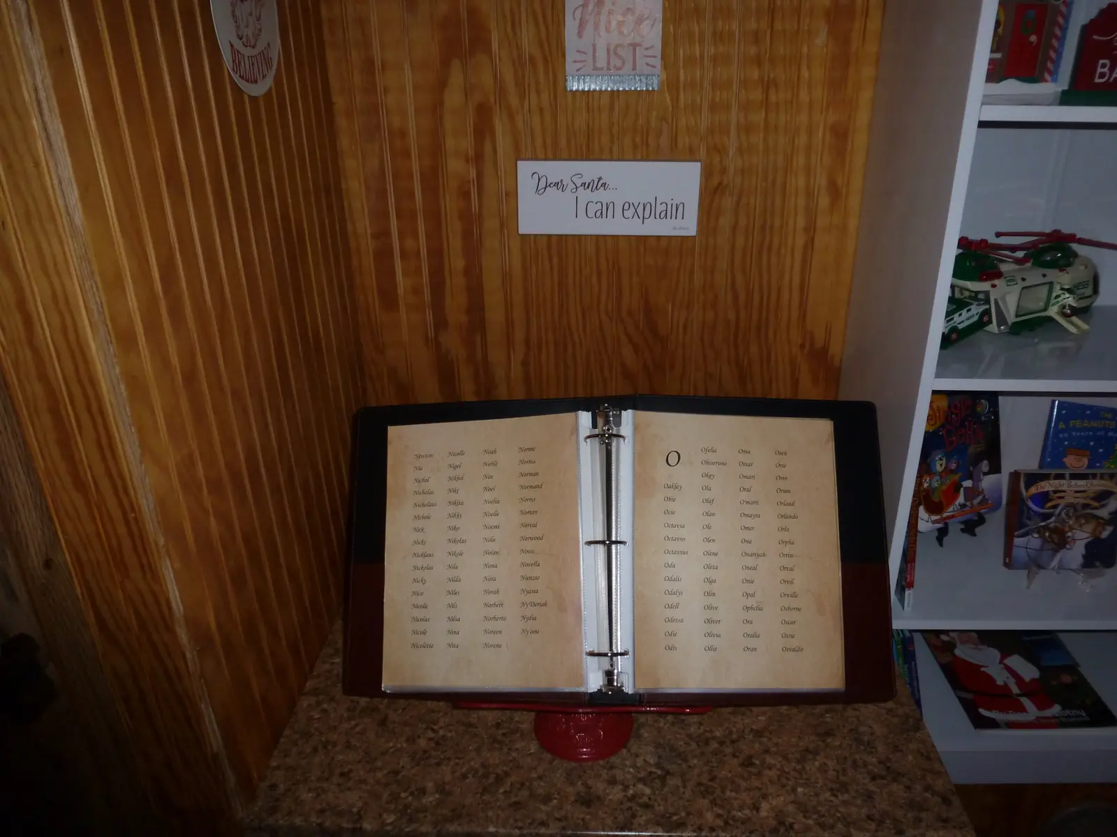 Open wish book ready for children inside Santa's Cabin